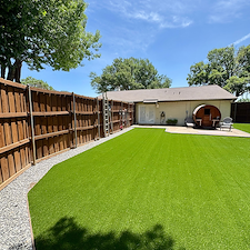 Full-Backyard-Artificial-Turf-Installation-with-Landscape-Rock-Border-in-Garland-TX 8